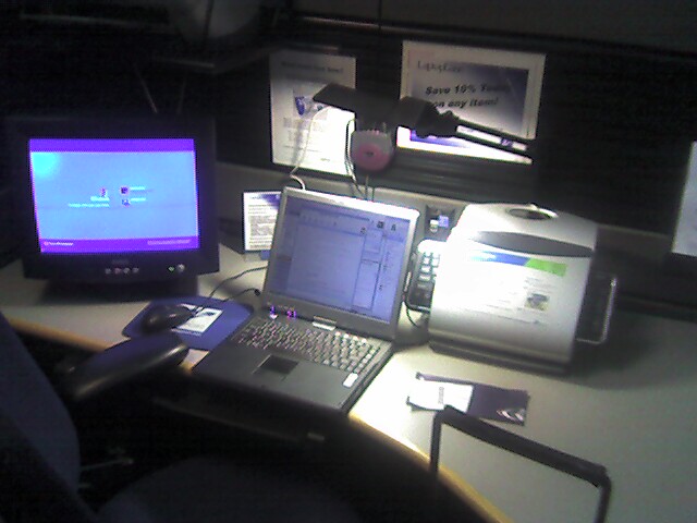 I know I have, from here on, become the worst kind of nerd, but hey moblogging is fun. This is a shot of a rentable office in O'Hare Airport offered by a company called Laptop Lane.