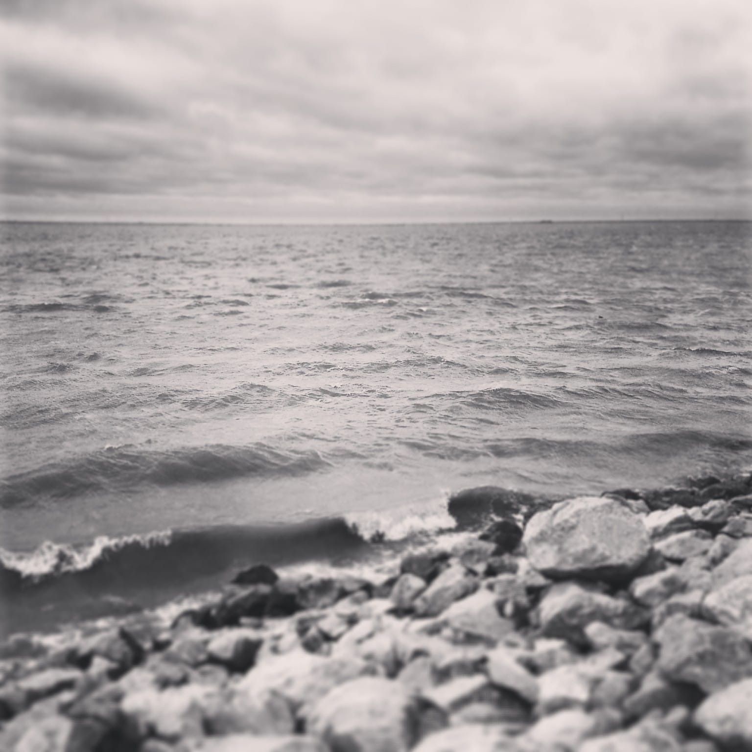 B&W photo of a grey day over Lake Hefner.