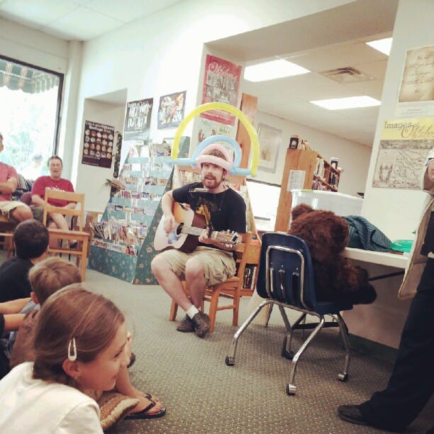 Soaking up the AC at the public library and catching the kids show.