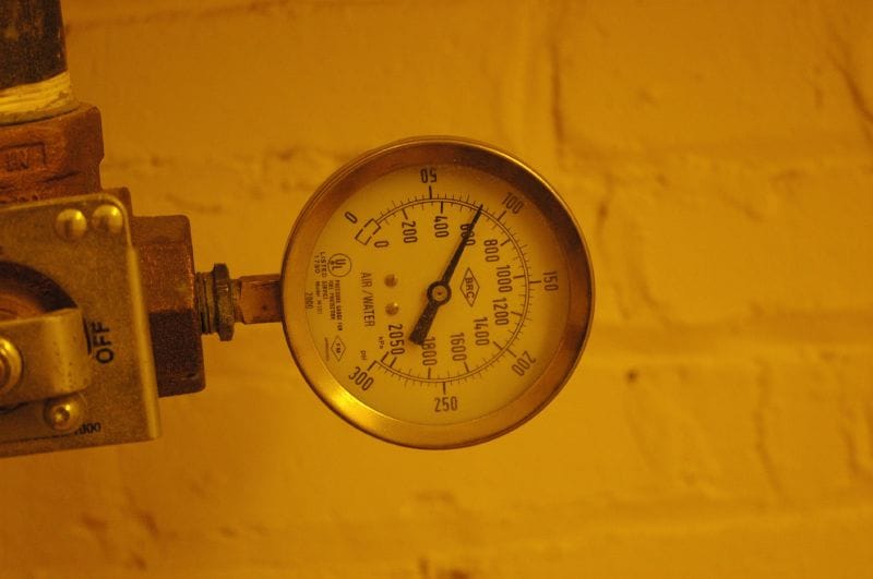 A pressure gauge in my office stairwell. Taken with a Nikon D70.